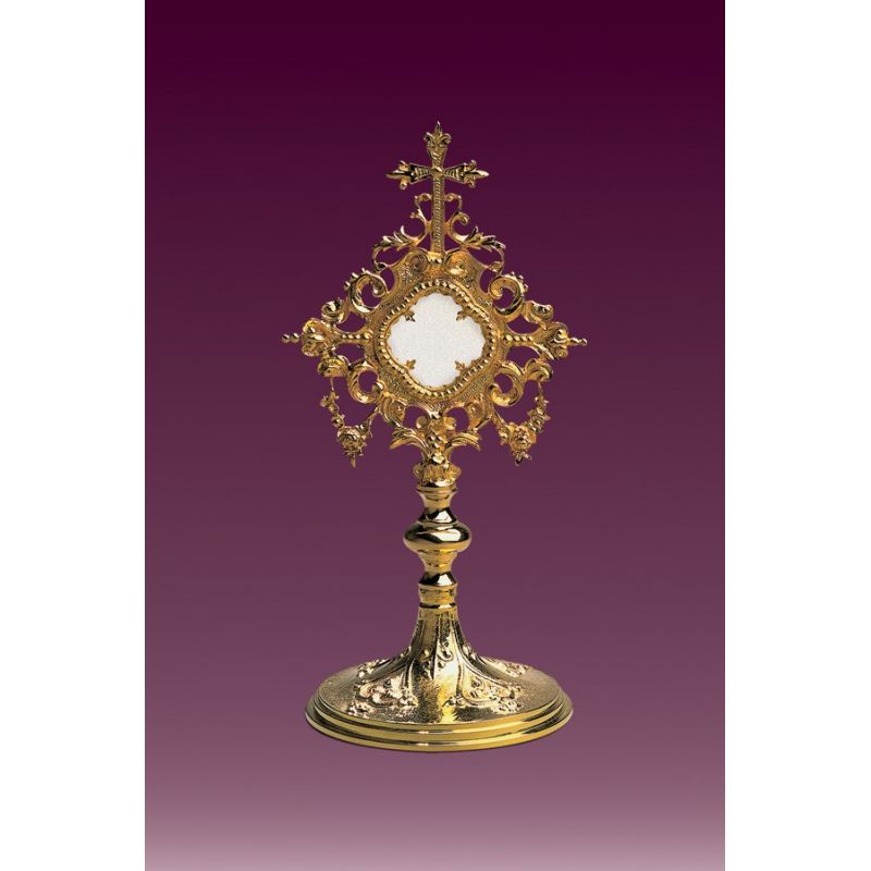 Relikwiarz złocony h: 25 cm. - Relikwiarz złocony h: 25 cm.